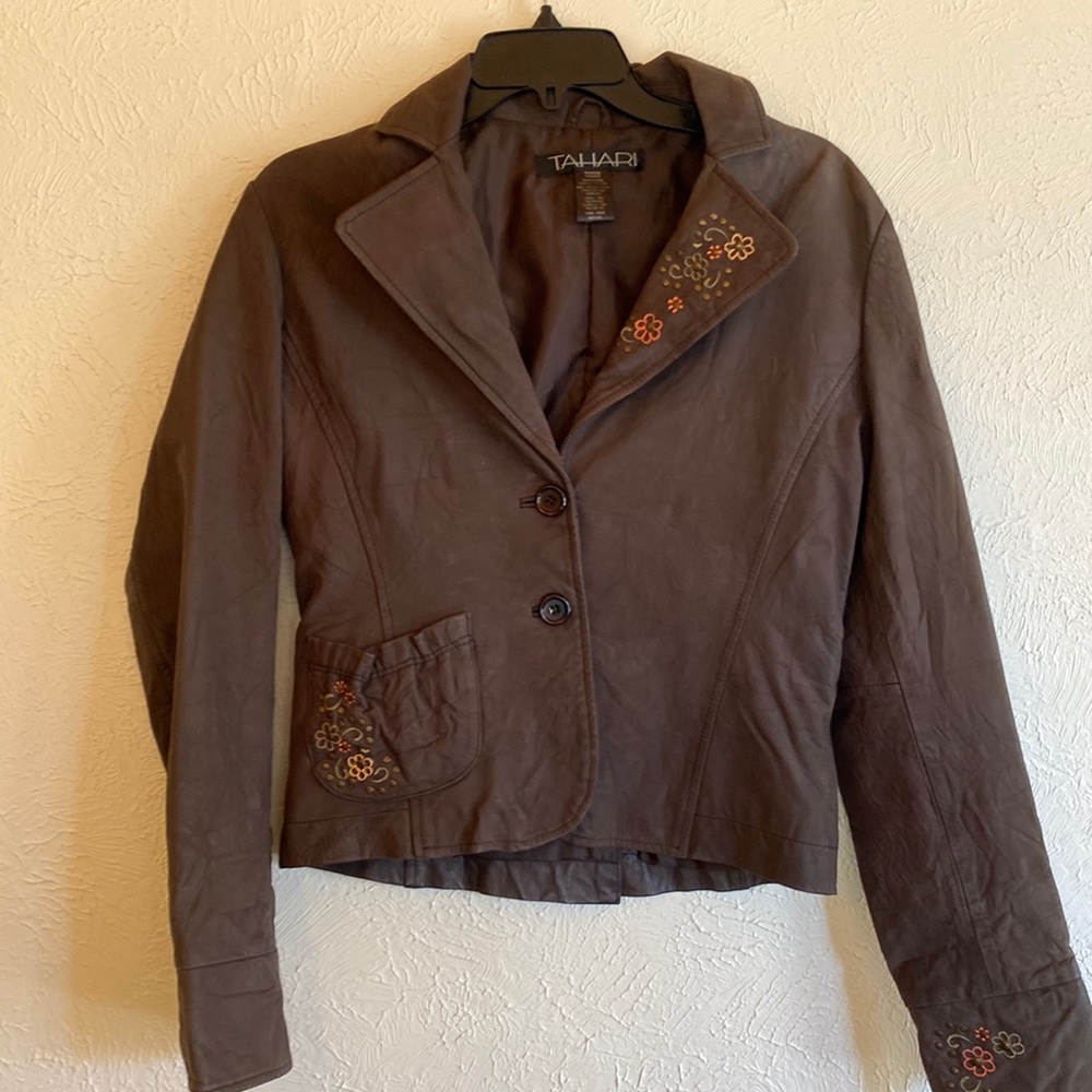 Tahari 100% leather jacket. Excellent condition. Beautiful. Size medium.